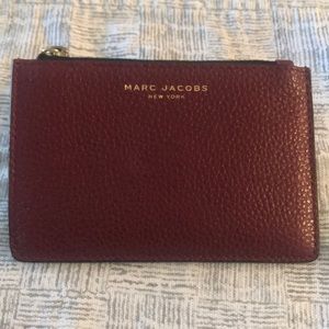 Key chain, driver’s license, credit card pouch.